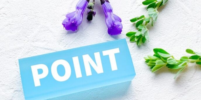 白い背景に青い「POINT」の文字と、紫色の花と緑の葉が添えられた爽やかな構図。
